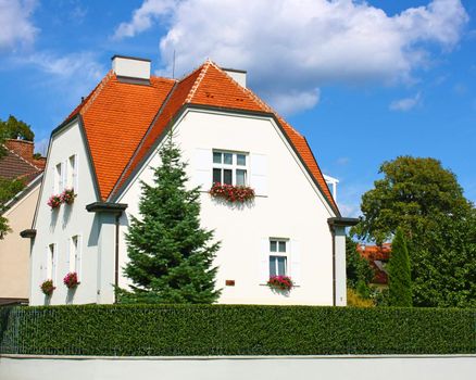 Beautiful white house in a modern residential area.
