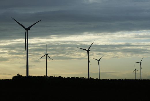 Sillhouetes of some wind turbines in europe.