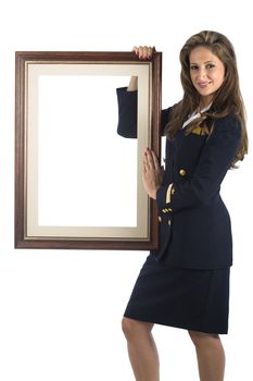 A young brazilian model in a studio shot, wearing a seaman's (or seawoman's) uniform, isolated on white and holding a picture frame..