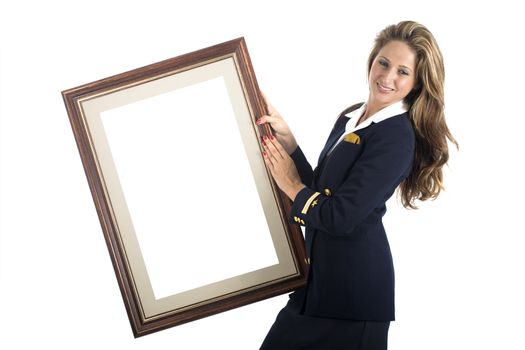 A young brazilian model in a studio shot, wearing a seaman's (or seawoman's) uniform, isolated on white and holding a picture frame..