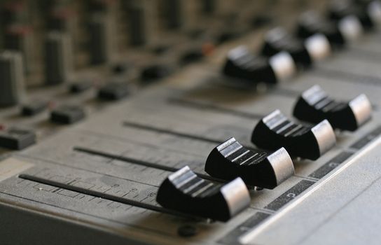 Macro shot of a proffesional audio mixer.