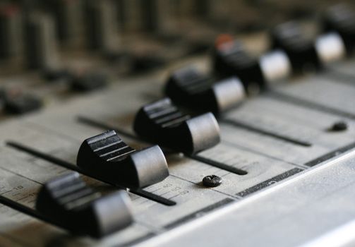 Macro shot of a proffesional audio mixer.