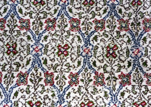 A close-up image of handmade Persian carpet
