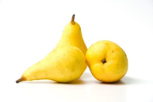 Yellow ripe juicy pears on white background