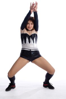 young girl in balck and white stage costume on white
