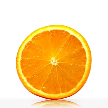 Slice of orange on a white background with reflection