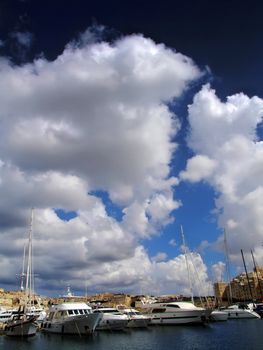 Beautiful yachts moored at the Vittoriosa Yacht Marina in Malta in the Med
