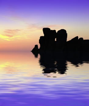 The oldest free-standing building/temple in the world. Oldest neolithic prehistoric temple built thousands of years before the pyramids. - Hagar Qim & Mnajdra Temples in Malta, Mediterranean Sea, Europe - here seen silhouetted at sunset