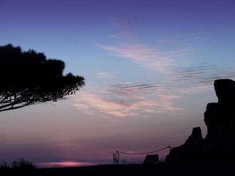 The oldest free-standing building/temple in the world. Oldest neolithic prehistoric temple built thousands of years before the pyramids. - Hagar Qim & Mnajdra Temples in Malta, Mediterranean Sea, Europe - here seen silhouetted at sunset