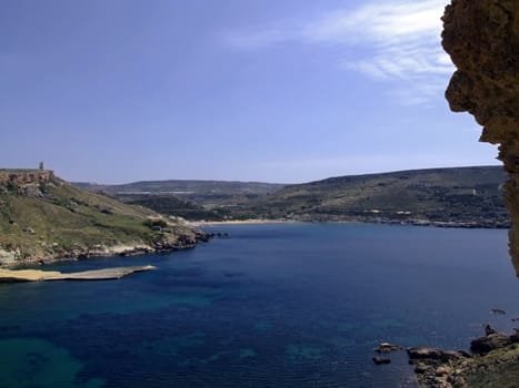 Typical rocky coastline in Malta, punctuated with sheer drops and jagged cliffs