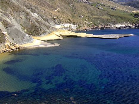 Typical rocky coastline in Malta, punctuated with sheer drops and jagged cliffs