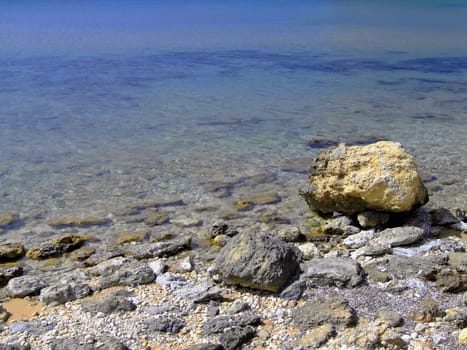 Typical rocky coastline in Malta, punctuated with sheer drops and jagged cliffs