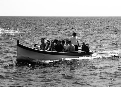 Group of tourists on leisure boat in Malta