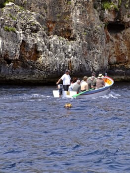 Group of tourists on leisure boat in Malta