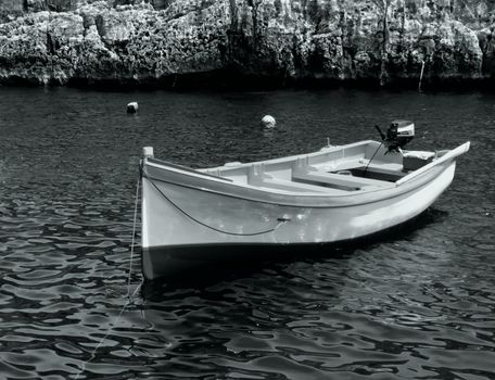 Fishing boat moored in a valley in Malta