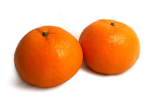 Two mandarin oranges on white background. Lunar New Year items.