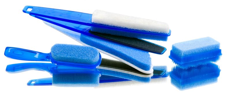 Blue pedicure tools on white background