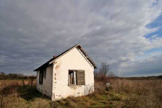 Small old house in the field