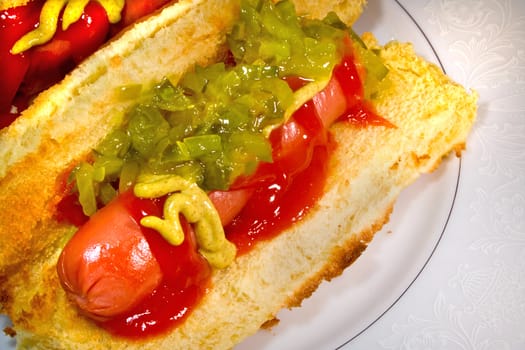 Hot dog with relish and ketchup on bun ready to eat or serve