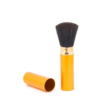 Cosmetics brush on a white background.