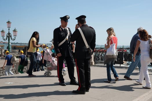 Uniformed police in Venice, or carabinieri on duty in Venice, a popular tourist destination and place for petty crime like pick-pockets. 2011.