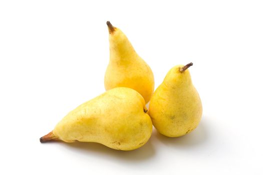 Yellow ripe juicy pears on white background