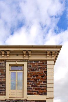 Historic Stone Building with Upper Storey Door as Window