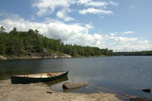 Image of a canoe in the Honey Harbour area of Georgian Bay, on a beautiful sunny day.