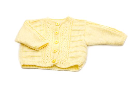 Wool hand-made yellow baby coat over white