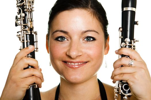 Cheerful clarinetist women. Close-up shot. Isolated on white