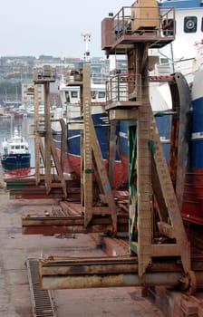 Boats in dry dock getting repaired. 