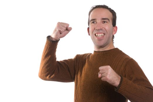 A young man is cheering about something and looking very happy, isolated against a white background