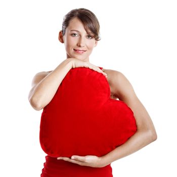 Beautiful young woman holding a red heart, Valentine concept