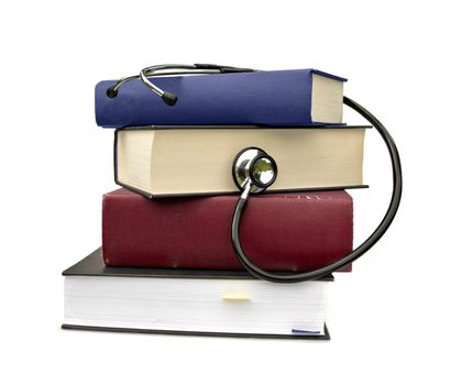 studying medicine or research book with stethoscope on white