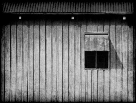 the old window on the barn is open 