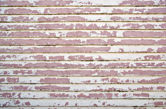 old weatherboard wooden wall all the paint peeling