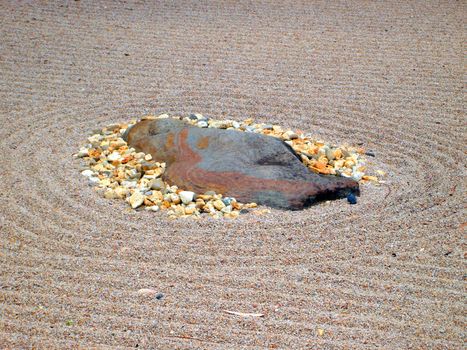 Karesansui - Sea of Sand - Japanese dry rock garden intended to evoke the vastness of sea with its islands and continents.