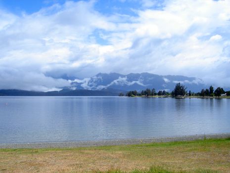 Misted Mountain behind Lake Te Anau, New Zealand