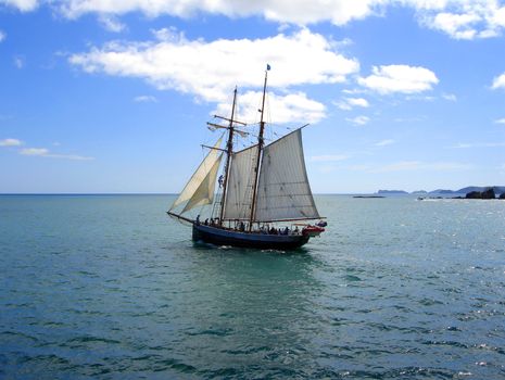 Tall Ship (R.Tucker Thompson) sailing through the Bay of Islands, New Zealand