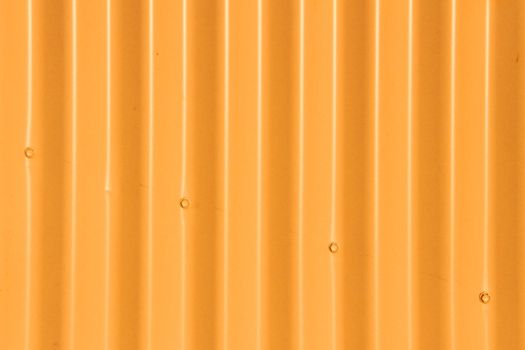 Background - Orange Corrugated Iron Fence with Four Diagonal Bolts