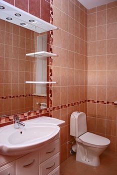 The spacious modern bathroom which has been laid out by a tile