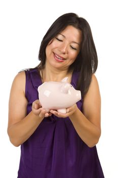 Smiling Hispanic Woman Holding Piggy Bank Isolated on a White Background.