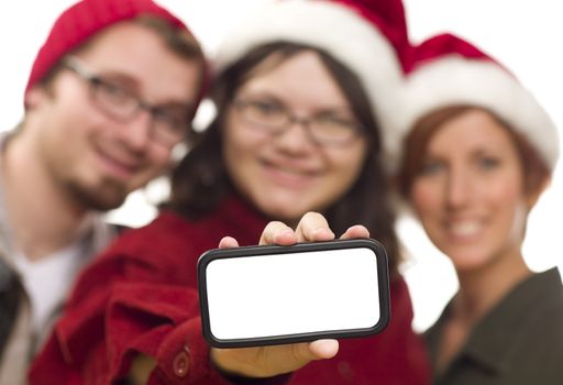 Girl with Friends and Santa Hats Holding Blank White Smart Phone - Ready for Your Own Message.