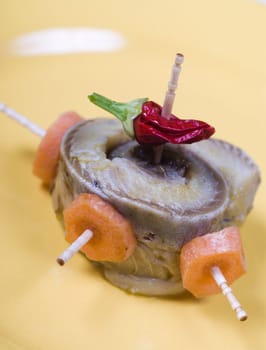 Rolled fillet herring with vegetables