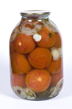 Jar of canned tomatoes on a white background