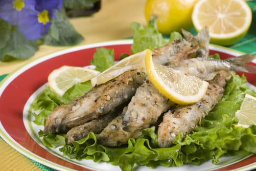  roast smelt with lemon and lettuce