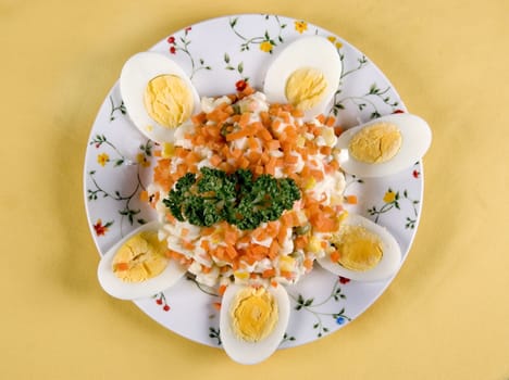 eggs salad with carrot in plate