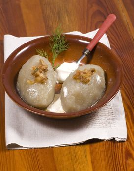 Potato dumplings with meat stuffed on desk