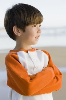 Portrait of a Little Boy Standing at The Beach
