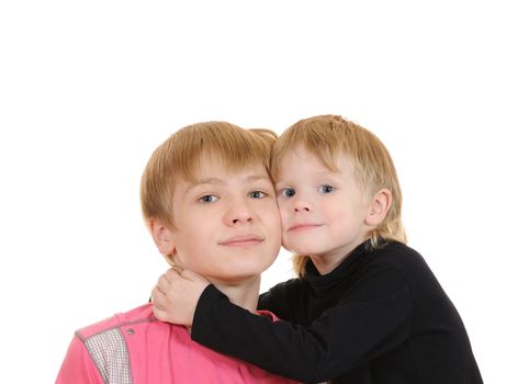 Two brothers embrace isolated on white background